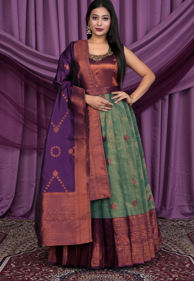 Woman wearing a traditional outfit with a purple and green Gown With Dupatta