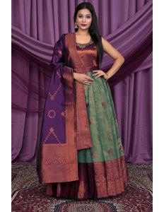 Woman wearing a traditional outfit with a purple and green Gown With Dupatta