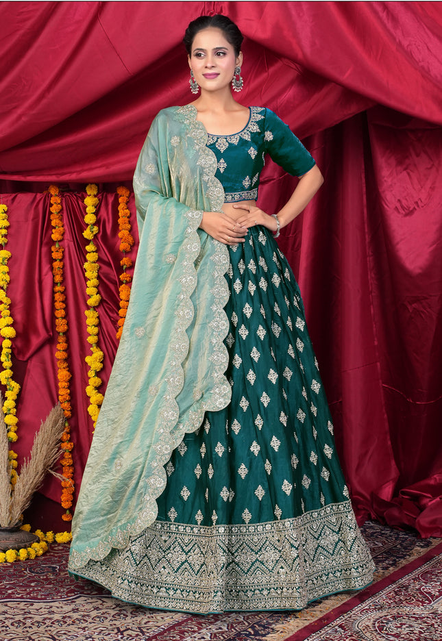 Woman in traditional Green Embroidered Lehenga Choli