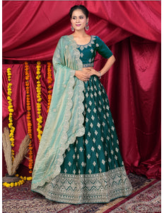 Woman in traditional Green Embroidered Lehenga Choli