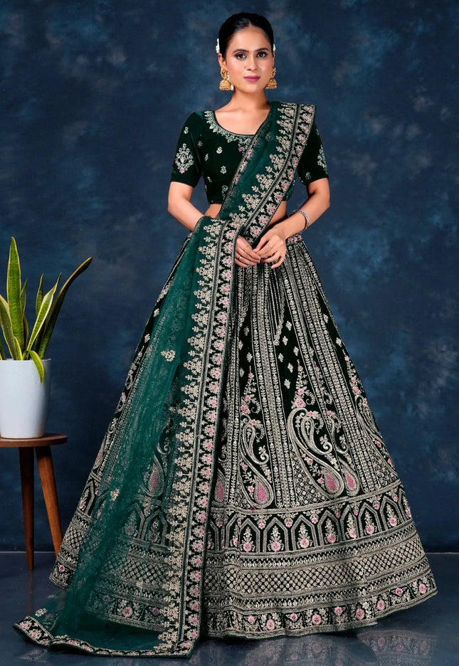 Green Heavy Embroidered Bridal Lehenga in Velvet