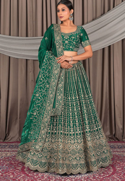 Woman wearing a green embroidered traditional outfit