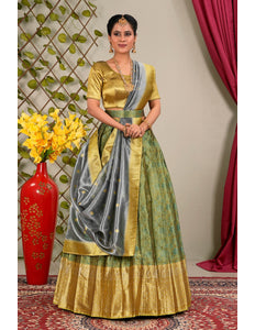 Woman in a traditional outfit with a lehenga choli with dupatta