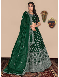 Woman wearing a green embroidered lehenga choli