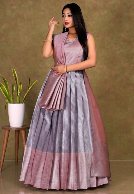 Woman wearing a two-tone long frock gown with dupatta