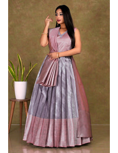 Woman wearing a two-tone long frock gown with dupatta
