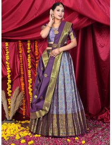 Woman in traditional purple and lavender lehenga choli