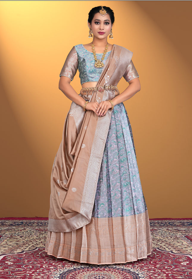 Woman wearing a traditional lehenga with a blue blouse