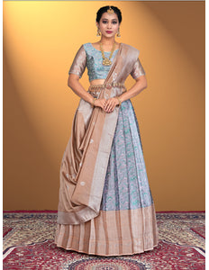 Woman wearing a traditional lehenga with a blue blouse