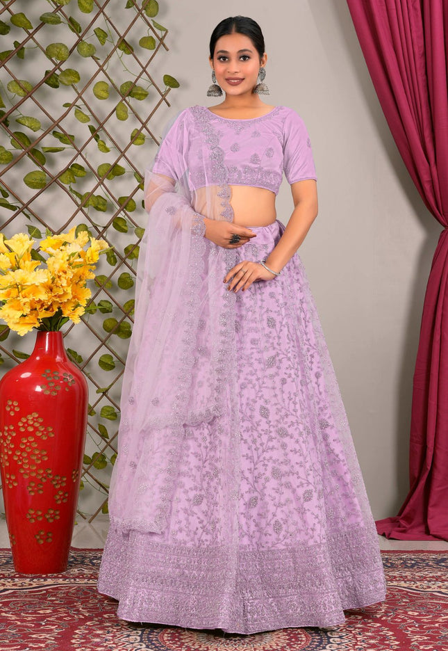Woman in a lavender traditional lehenga choli