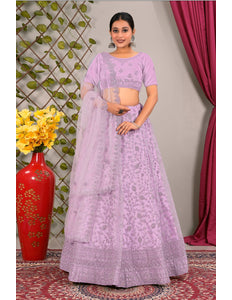 Woman in a lavender traditional lehenga choli