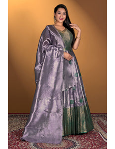 Woman wearing a lavender gown with purple dupatta