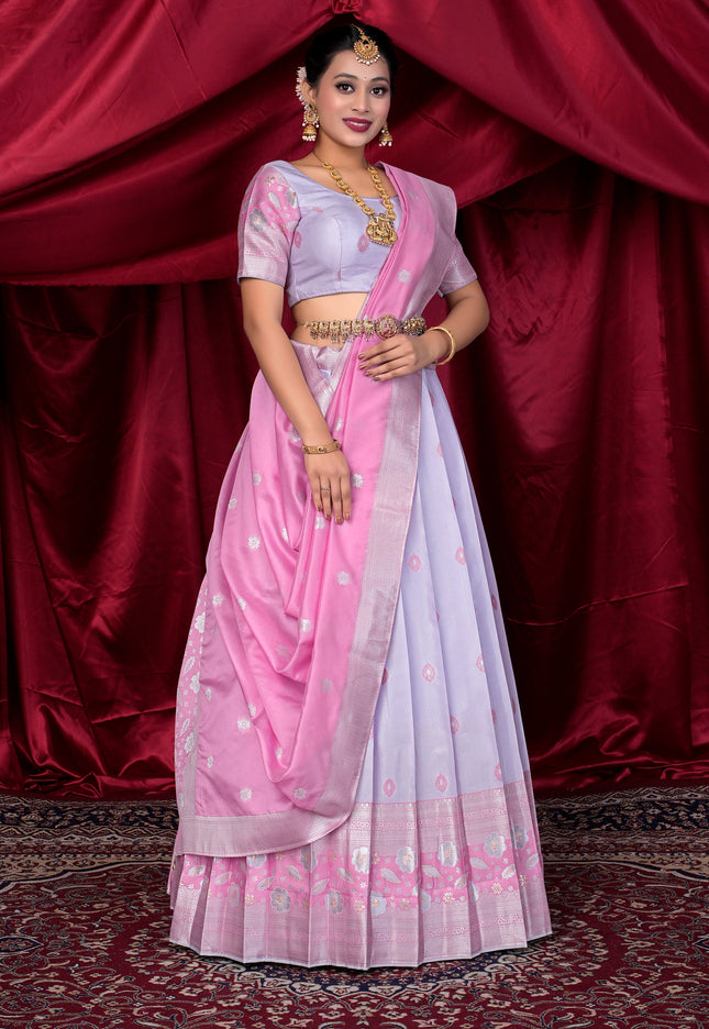 Woman wearing a Lavender and Pink lehenga choli