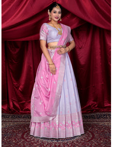 Woman wearing a Lavender and Pink lehenga choli