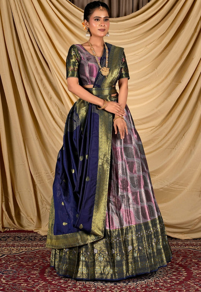 Woman wearing a traditional lehenga with a lavender and blue pattern