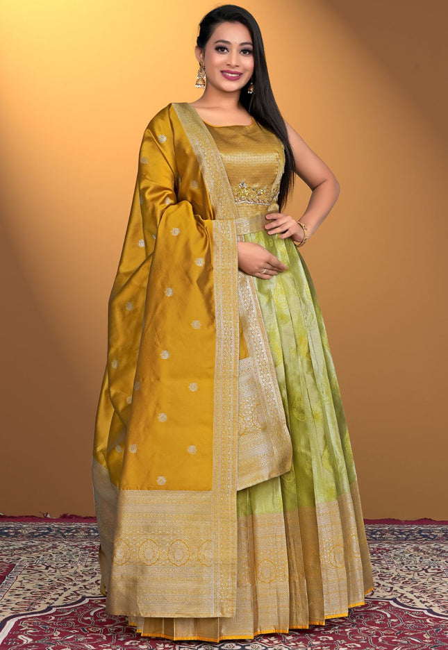 Woman wearing a yellow and green traditional outfit