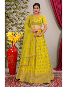 Woman in a yellow traditional lehenga choli