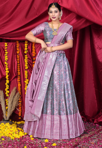 Woman in a traditional pink lehenga choli
