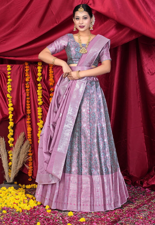 Woman in a traditional pink lehenga choli