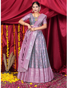 Woman in a traditional pink lehenga choli