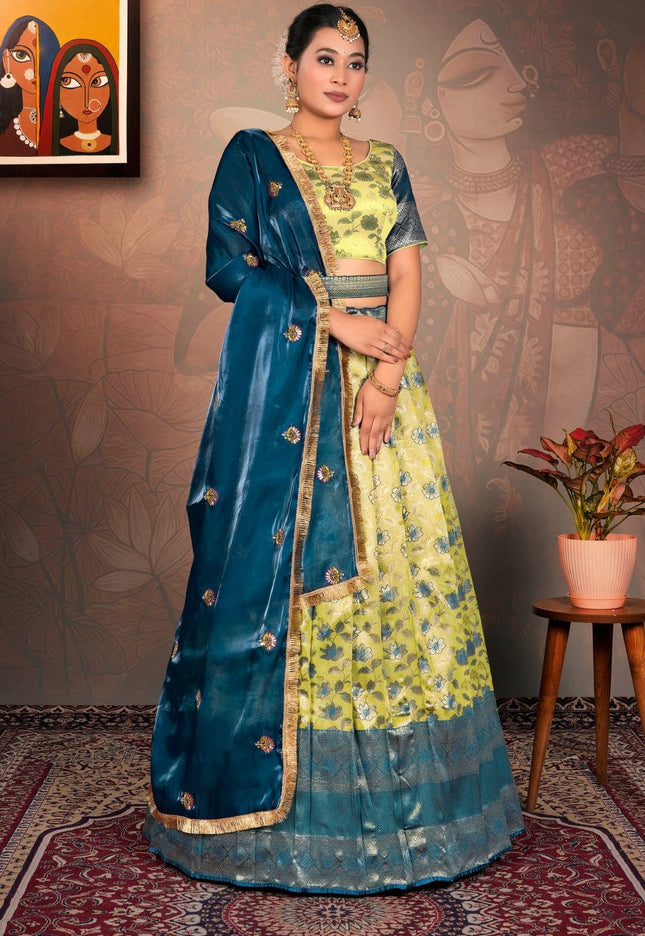Woman in a traditional blue and liril lehenga choli with dupatta
