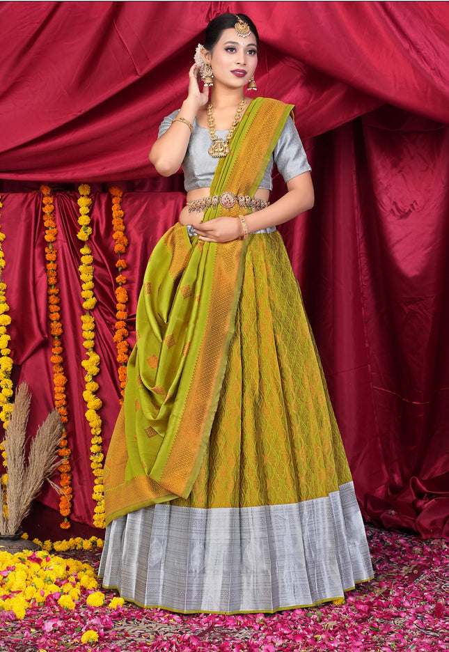 Woman in a traditional yellow and gray lehenga choli
