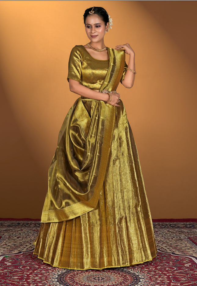 Woman wearing a gold traditional outfit