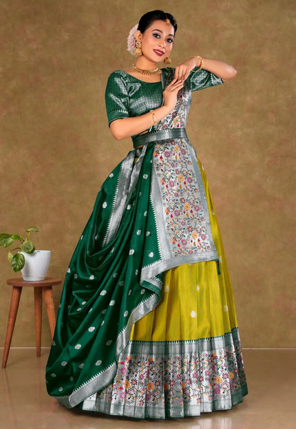 Woman wearing a traditional green and liril lehenga choli