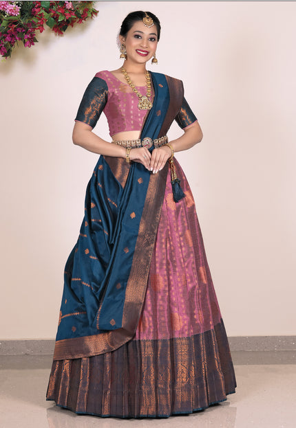 Woman wearing a traditional lehenga with a pink blouse