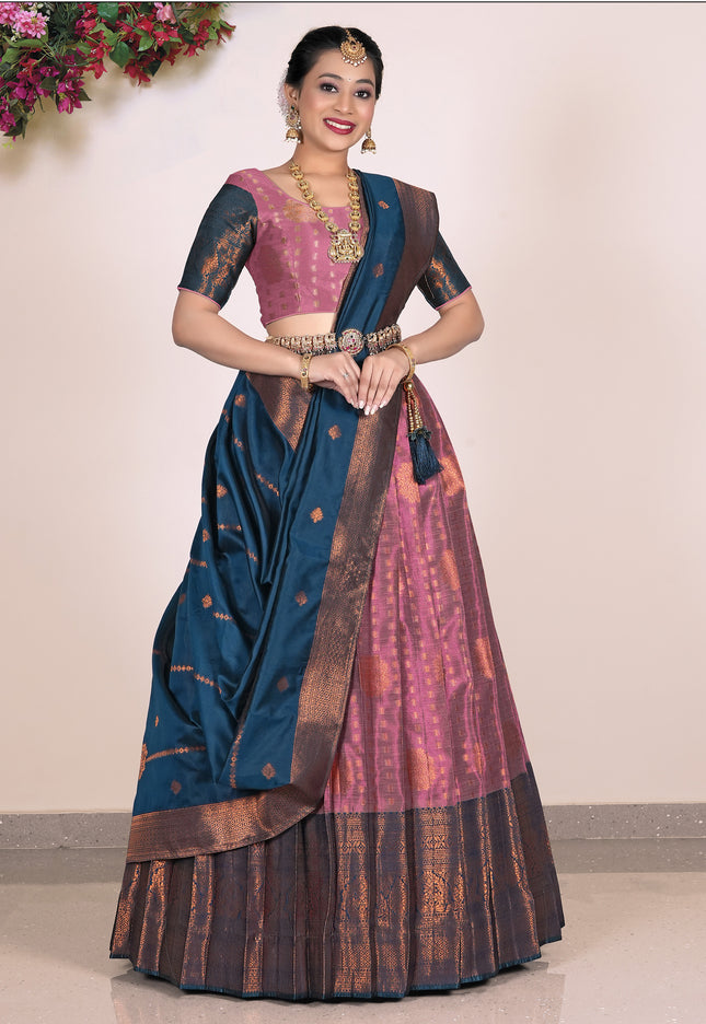 Woman wearing a traditional lehenga with a pink blouse