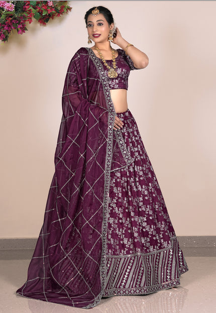 Woman wearing a purple lehenga with a matching blouse