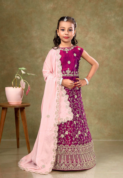 Young girl in a traditional outfit Kids Readymade Lehenga For Girls