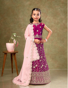 Young girl in a traditional outfit Kids Readymade Lehenga For Girls