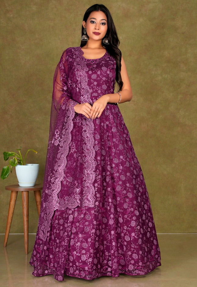 Woman wearing a Maroon dress with a matching dupatta Net Gown For Women
