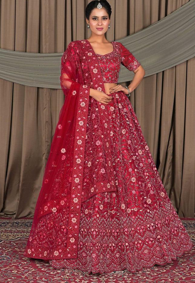 Woman wearing a red patterned traditional outfit