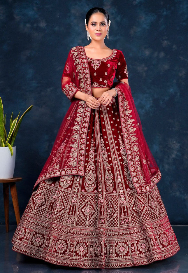 Woman wearing a red embroidered traditional outfit