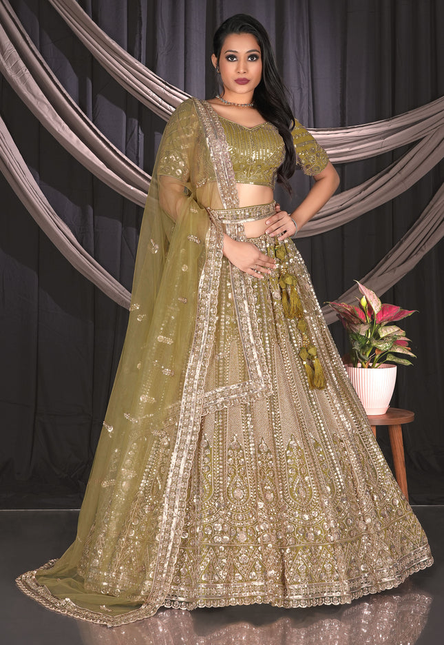 Woman in a Mehendi traditional lehenga choli outfit