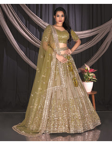 Woman in a Mehendi traditional lehenga choli outfit