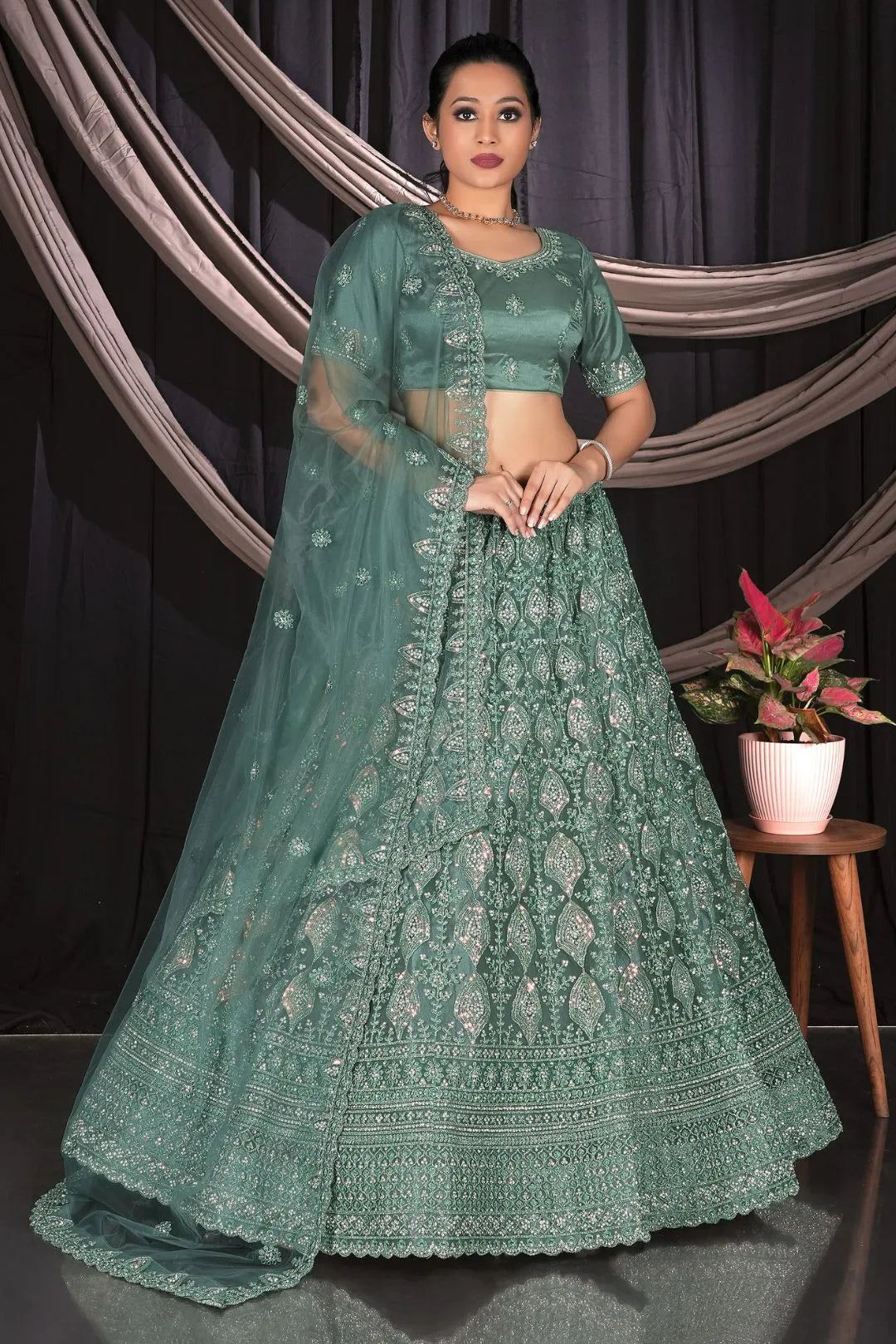 Mehendi Exclusive Net Lehenga Choli With Embroidered Work