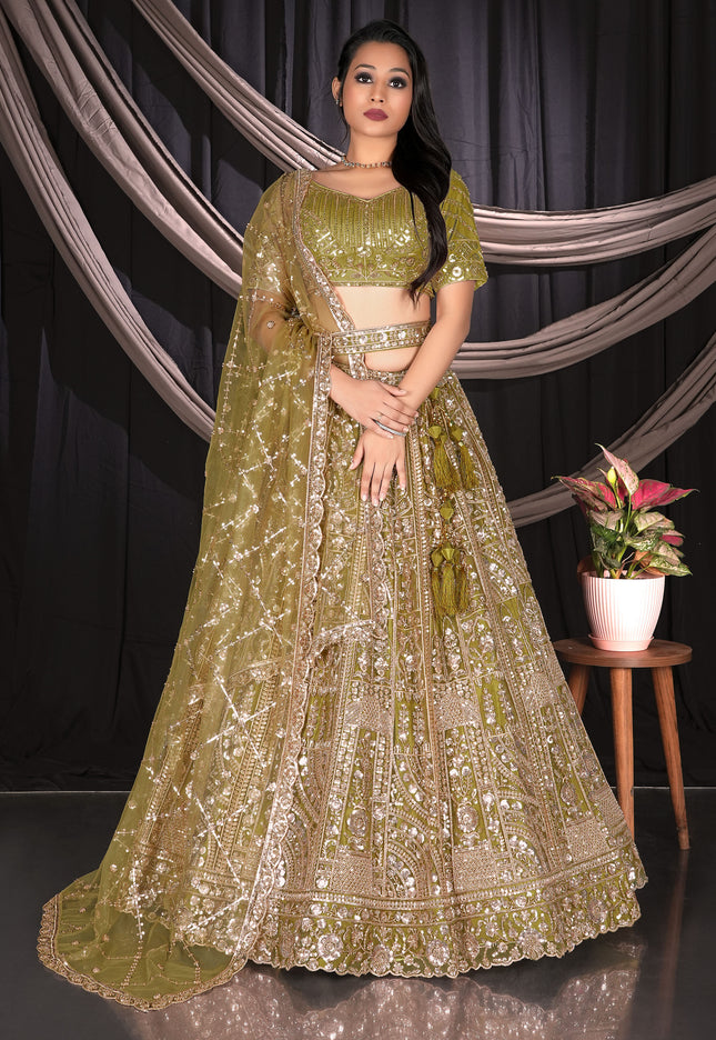 Woman in a mehendi embroidered traditional outfit