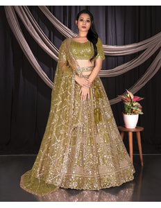 Woman in a mehendi embroidered traditional outfit