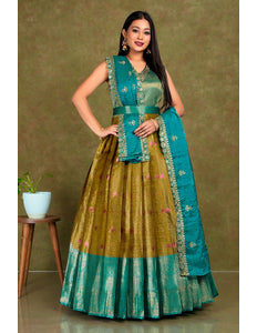 Woman wearing a traditional outfit with green and yellow colors