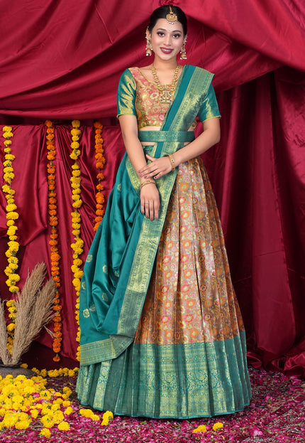 Woman in traditional green and gold lehenga choli
