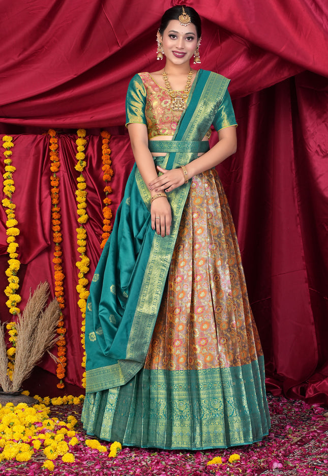 Woman in traditional green and gold lehenga choli