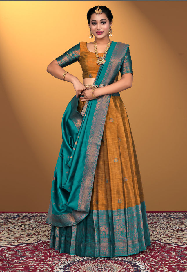 Woman wearing a traditional lehenga choli with a yellow and blue color