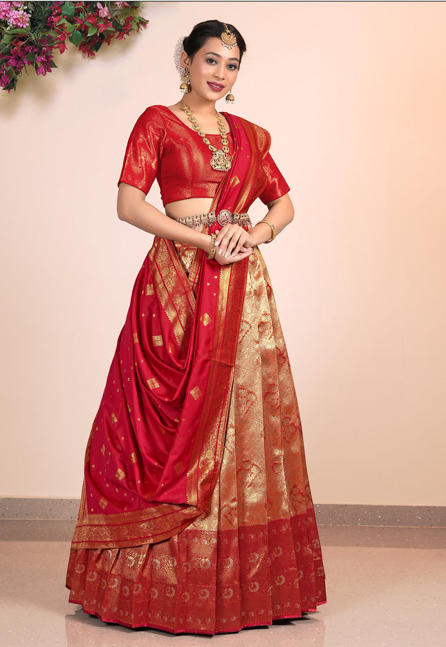 Woman wearing an orange and Red Contrast Lehenga Choli