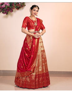 Woman wearing an orange and Red Contrast Lehenga Choli