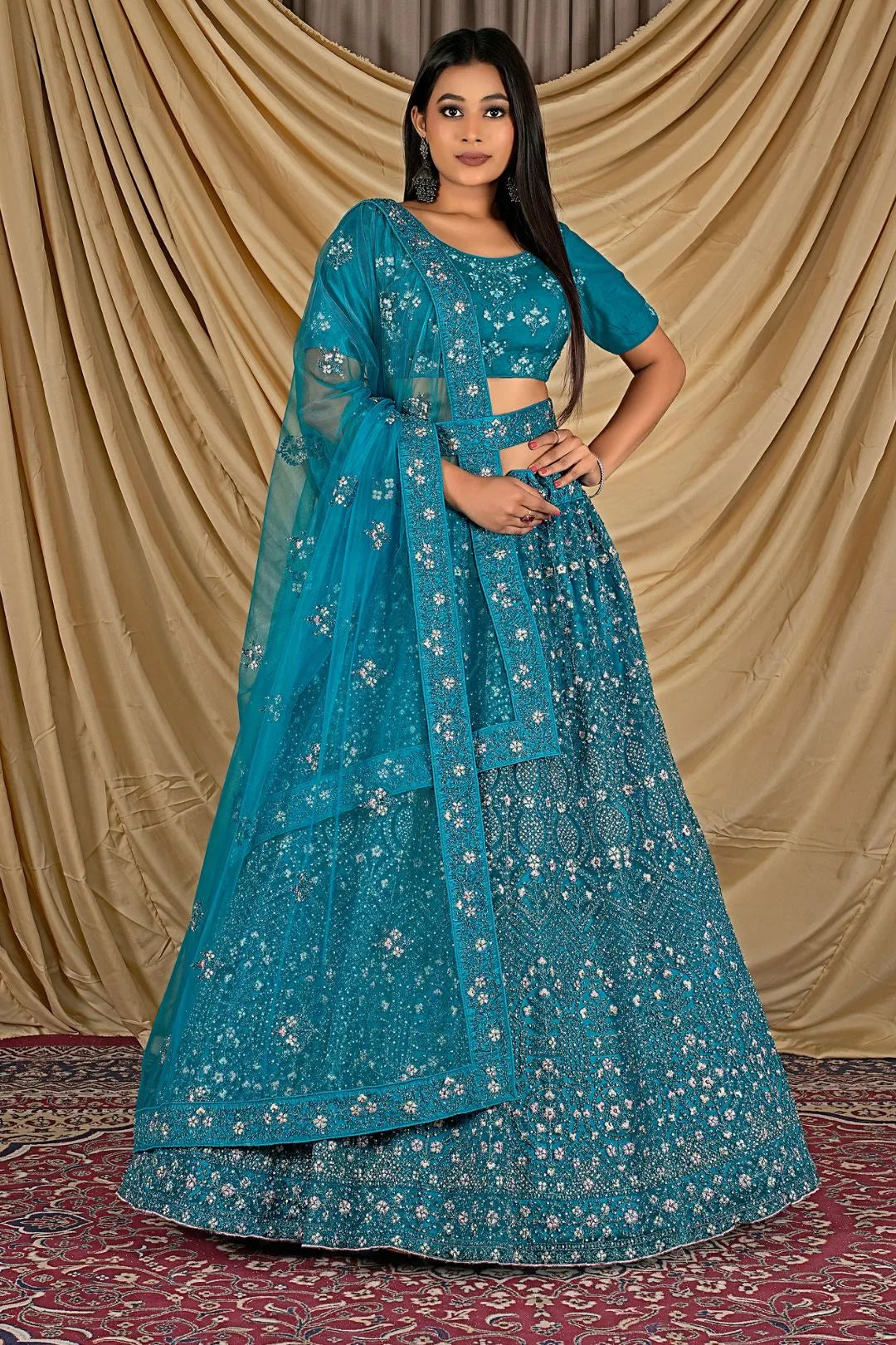 Firozi Party Wear Embroidered Net Lehenga Choli For Women