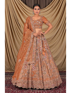 Rust Party Wear Embroidered Twill Net Lehenga Choli For Women