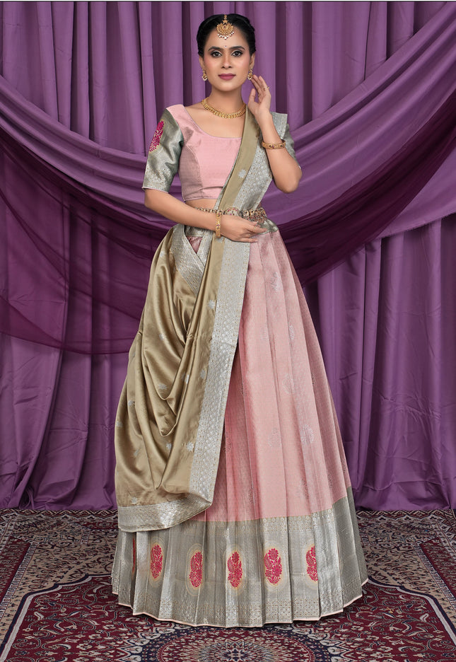 Woman wearing a traditional pink and gold outfit